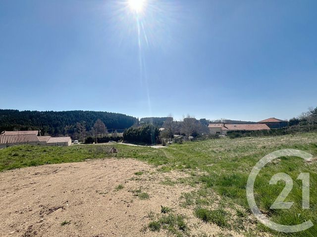 Afficher la photo en grand terrain à vendre - 1801.0 m2 - ST JUST MALMONT - 43 - AUVERGNE - Century 21 Agence Des Sucs
